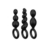 Three different sizes of silicone anal plugs in the Satisfyer Booty Call set